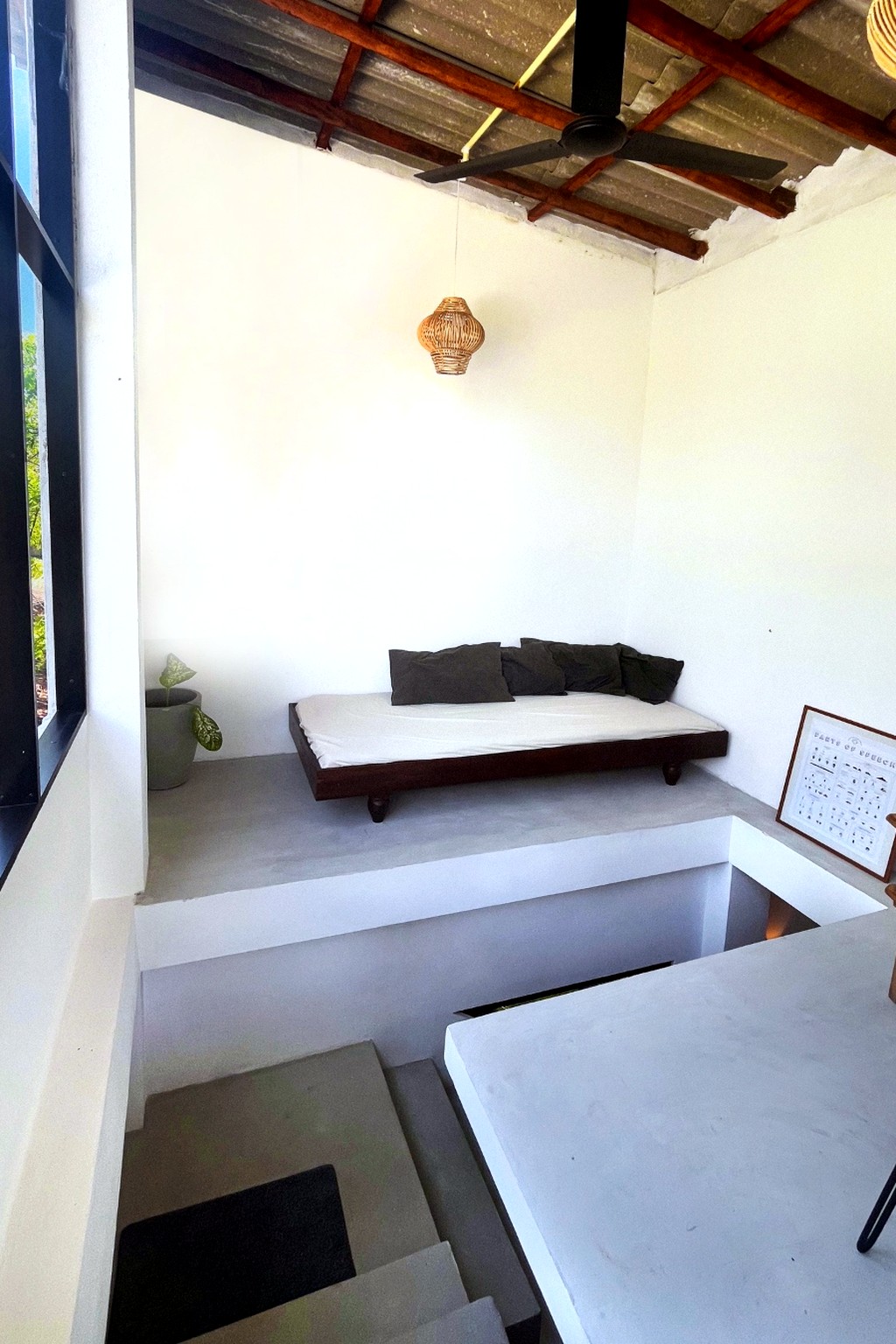 Casa loft · daybed under the angled ceiling