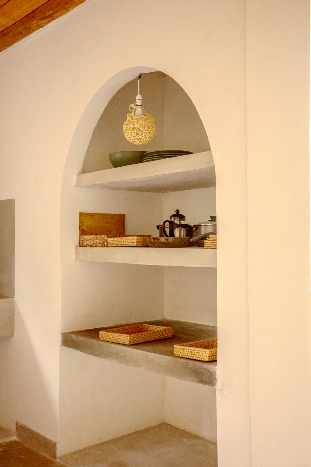 Casa built-in arched pantry with pendant light