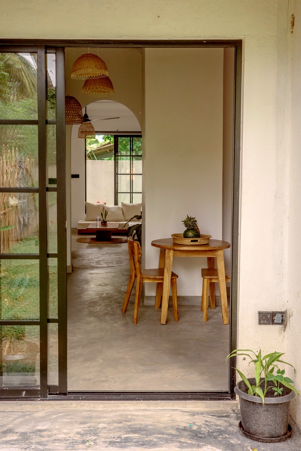 Casa terrace doors opening into the dining and living space